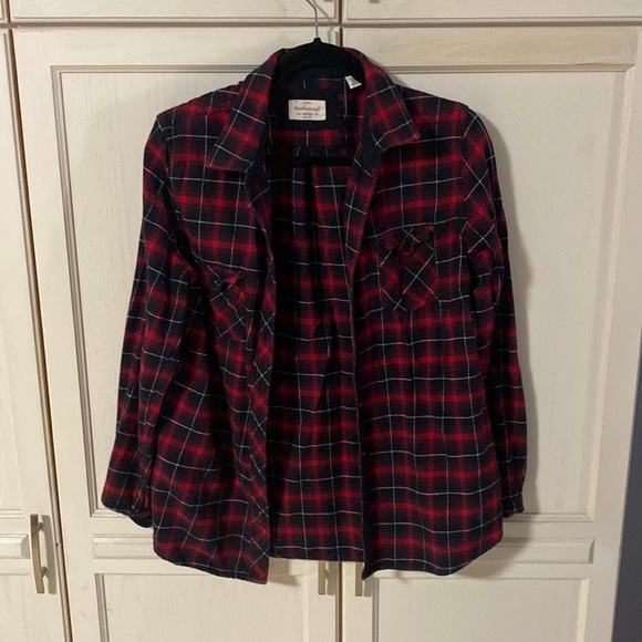 Tops - A red and black plaid shirt in size large